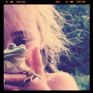 girl holding frog instagram