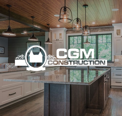 CGM Construction logo with a newly-built kitchen in the background.