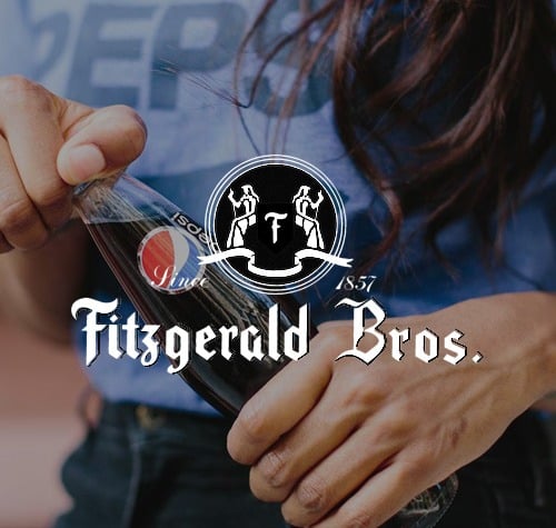 Fitzgerald Bros logo with a woman opening a beverage in the background.