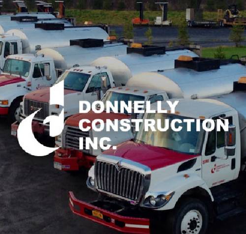 Donnelly Construction logo with their fleet of trucks in the background.