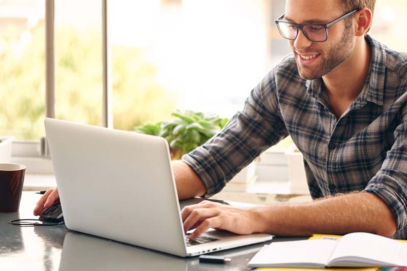 Guy using Laptop