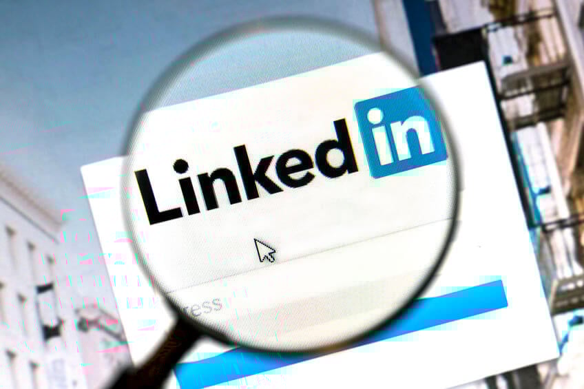 Linkedin website under a magnifying glass
