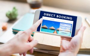 Woman booking directly on hotel mobile website