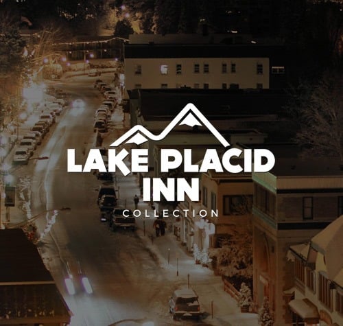 Lake Placid Inn logo with downtown Lake Placid in the background.