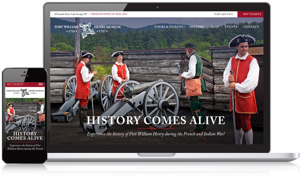 screen capture of website homepage and mobile phone of same image of soldiers in period dress around cannon