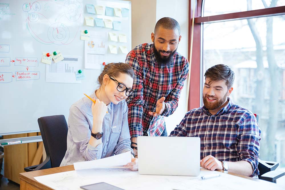 Employees figuring out what to do for their company's social media audit.