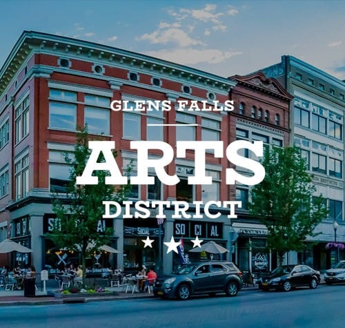 Glens Falls Arts District logo with downtown Glens Falls in the background.