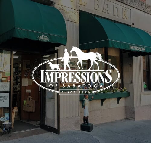 Impressions of Saratoga logo with their store in the background.