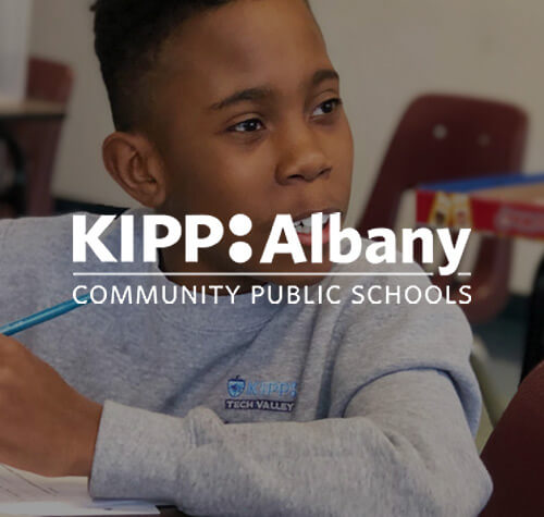 Kipp Tech Valley Charter School Albany logo with a young student in the background.