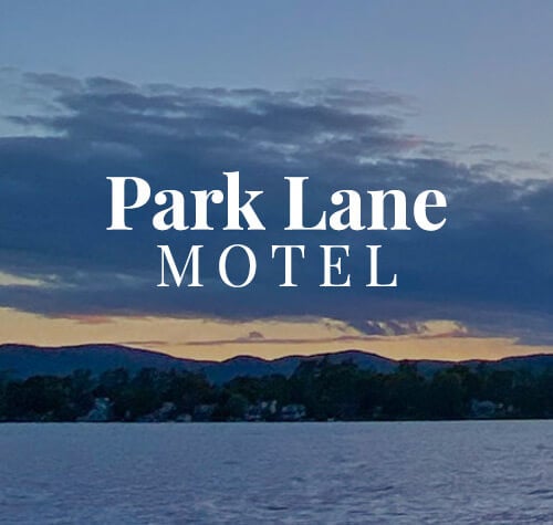 Park Lane Motel logo with a lake in the background.