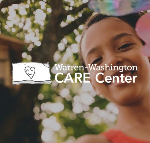 Warren-Washington CARE Center with a patient in the background.