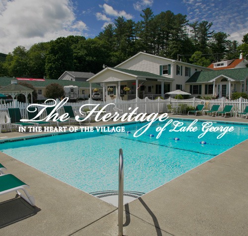 The Heritage of Lake George logo with their pool in the background.