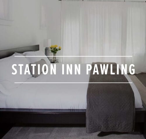 Station Inn Pawling logo with one of their rooms in the background.