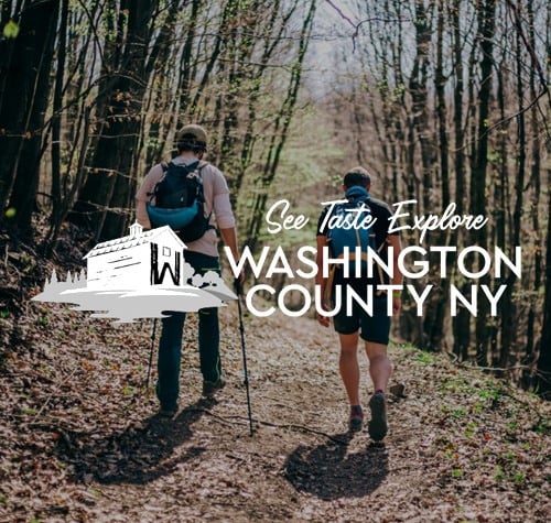 Washington County NY logo with people hiking in the background.