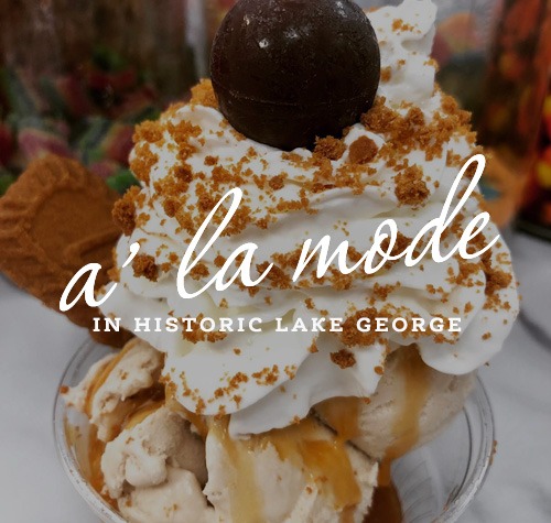 A La Mode logo with one of their desserts in the background.