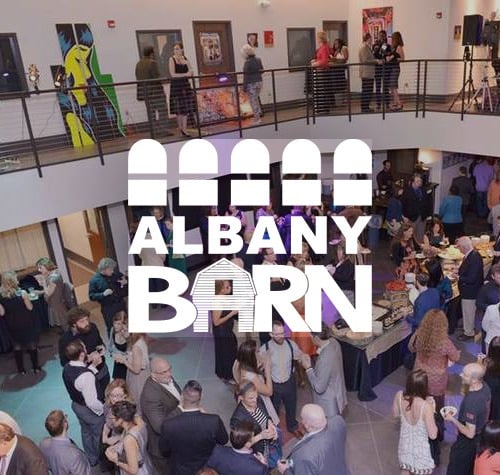 Albany Barn logo with adults gathering for an event in the background.