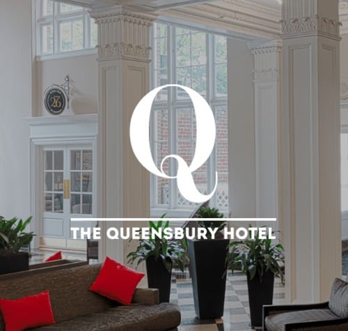 The Queensbury Hotel logo with the hotel lobby in the background.